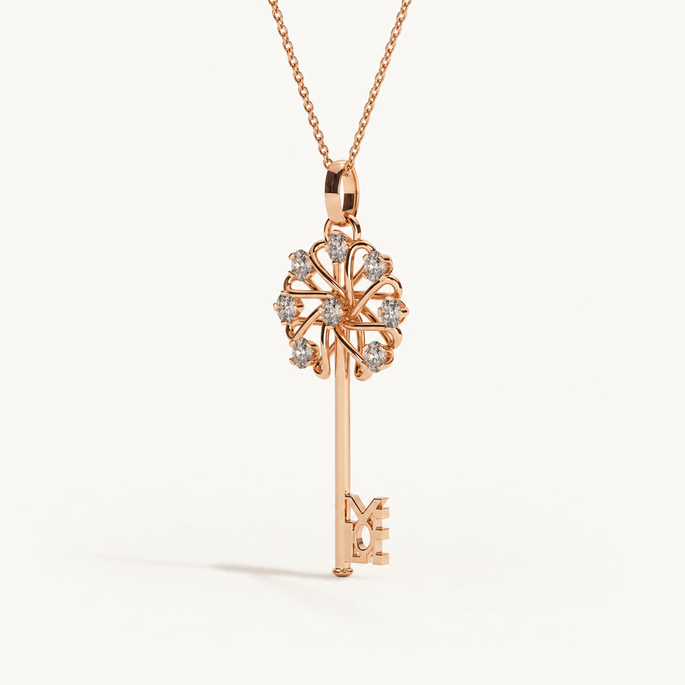 Everbell Key Pendant in 18K rose gold with diamonds — three-quarter view