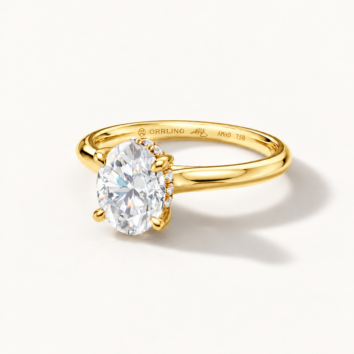 Ovelia 18K yellow gold, subtle Orrling engraving