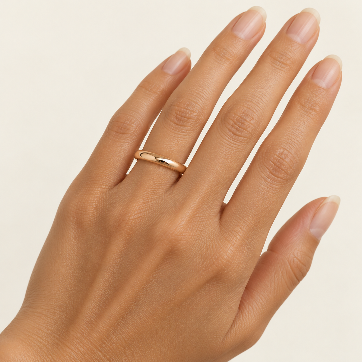 ARCADIA 3 mm — woman wearing an 18K rose gold wedding band, AI model illustration