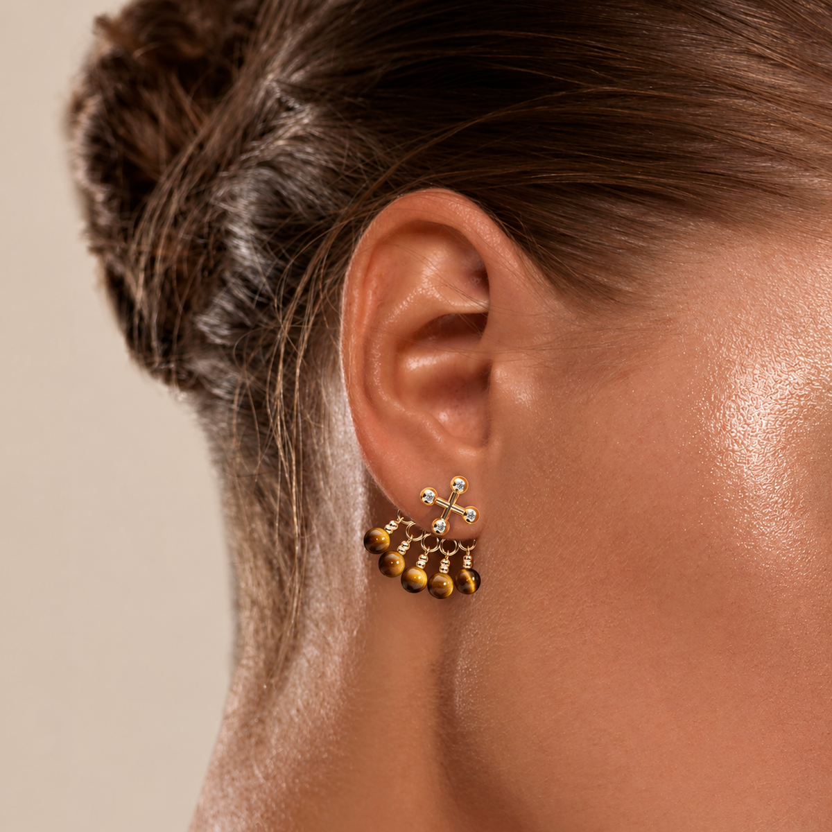Barbelle Backdrop Ear Studs – Tiger Eye – on-model