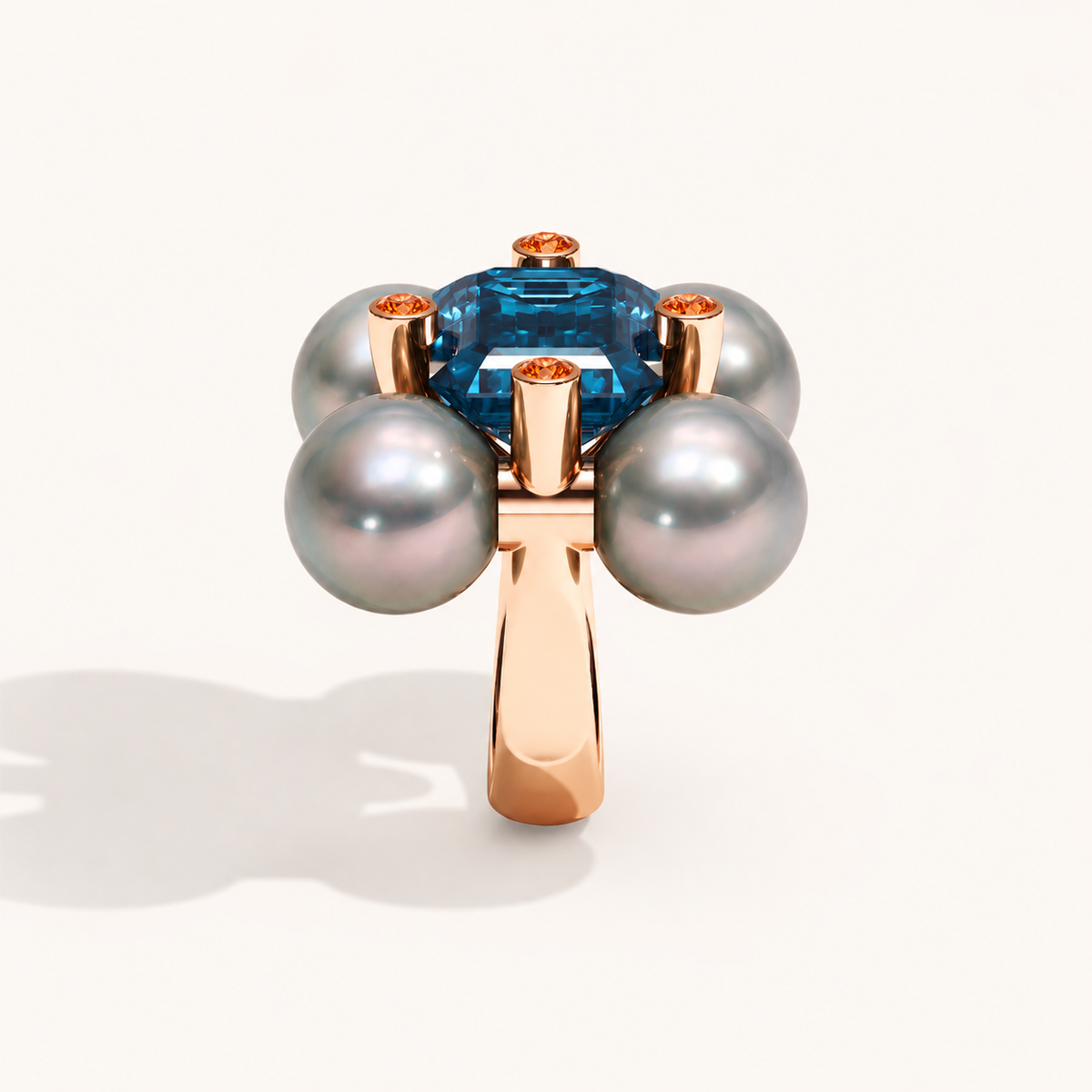 Barbelle London blue topaz, Tahitian pearls and mandarin garnets — side view