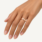 BASTION 5 mm — woman wearing an 18K rose gold wedding band, AI model illustration