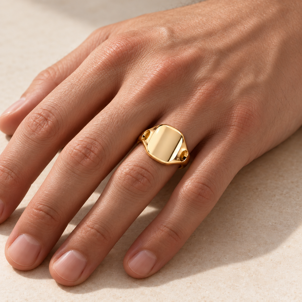 Cusion Void Ring – 18K yellow gold worn on a male hand