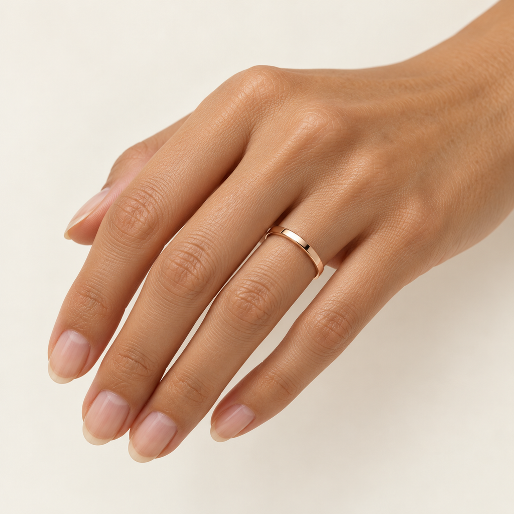 ECHELON 2 mm — woman wearing an 18K rose gold wedding band, AI model illustration
