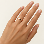 ECHELON 3 mm — woman wearing an 18K rose gold wedding band, AI model illustration