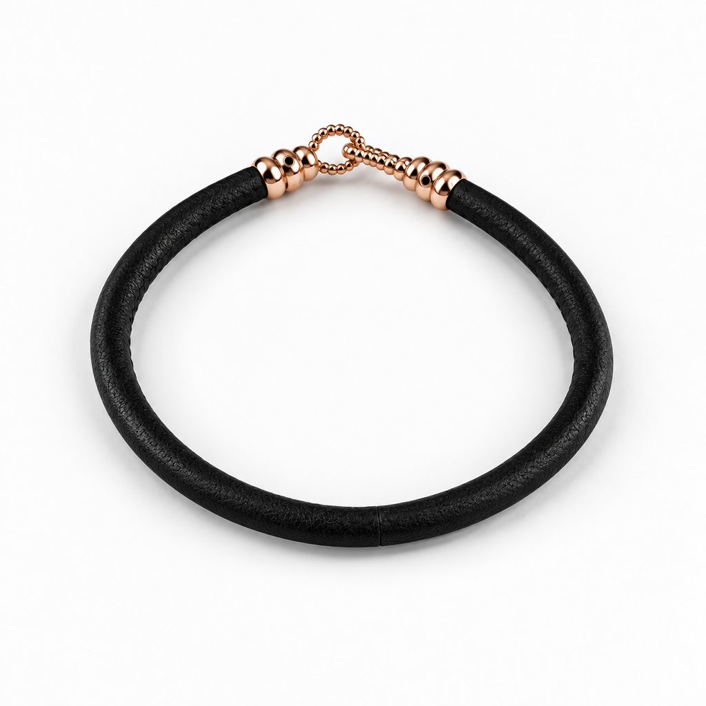 Molekule Hook Bracelet in Classic Black European calfskin with 9K rose gold hook, overhead view