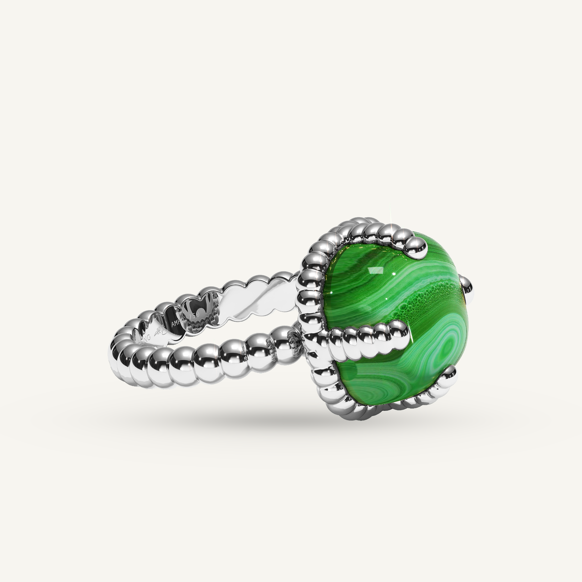 Molekules ring in white gold with cushion-shaped malachite, three quarter view