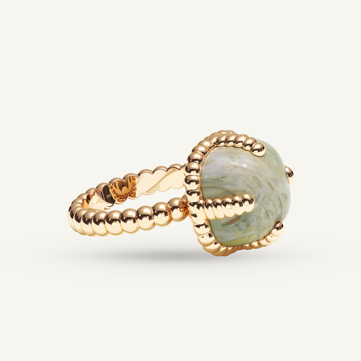 Molekules ring in rose gold with cushion-shaped picasso jaspis, three quarter view