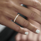 MONTE M25 3 mm diamond eternity ring in 18K yellow gold — original lifestyle photograph