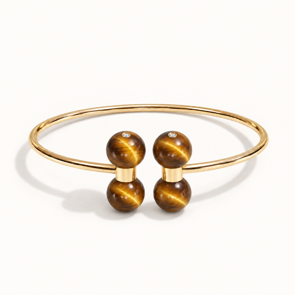 Barbelle Couple Bangle in 18K yellow gold with Tiger Eye and bezel-set diamond accents