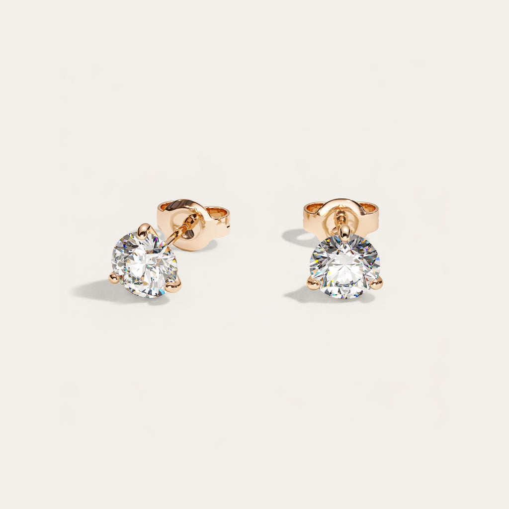 Truine diamond studs, Rose Gold, 1.00 ct per pair (0.50 ct per diamond), approx. 5.0 mm diameter. Proportional size illustration.