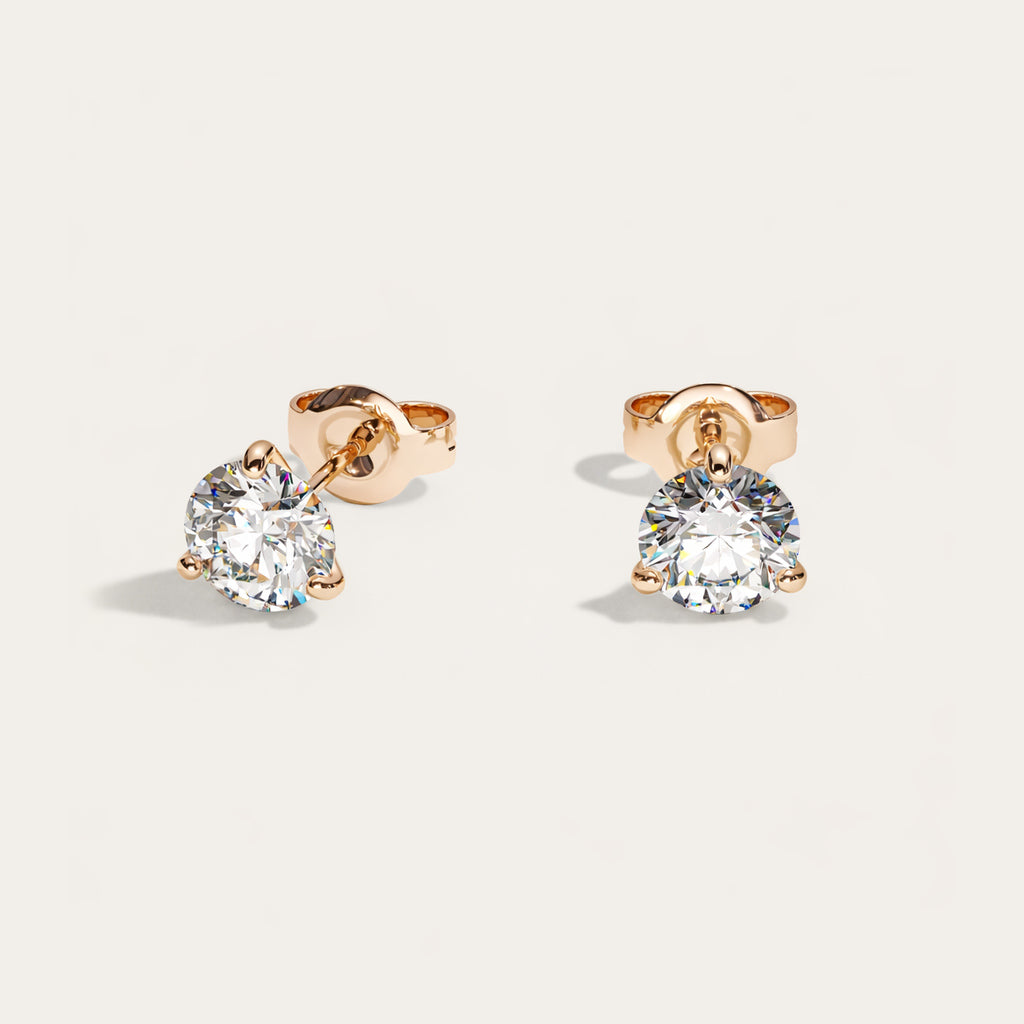 Truine diamond studs, Rose Gold, 1.40 ct per pair (0.70 ct per diamond), approx. 5.7 mm diameter. Proportional size illustration.