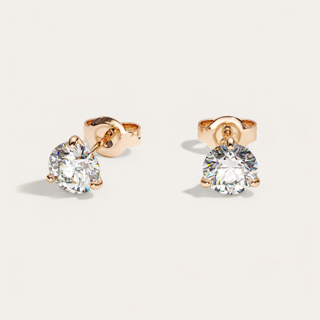 Truine diamond studs, Rose Gold, 1.80 ct per pair (0.90 ct per diamond), approx. 6.2 mm diameter. Proportional size illustration.