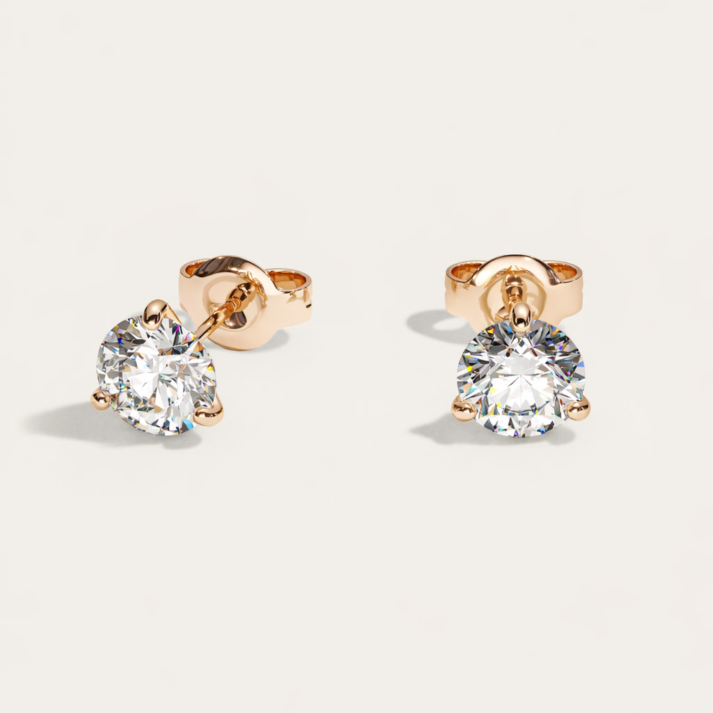Truine diamond studs, Rose Gold, 2.00 ct per pair (1.00 ct per diamond), approx. 6.5 mm diameter. Proportional size illustration.