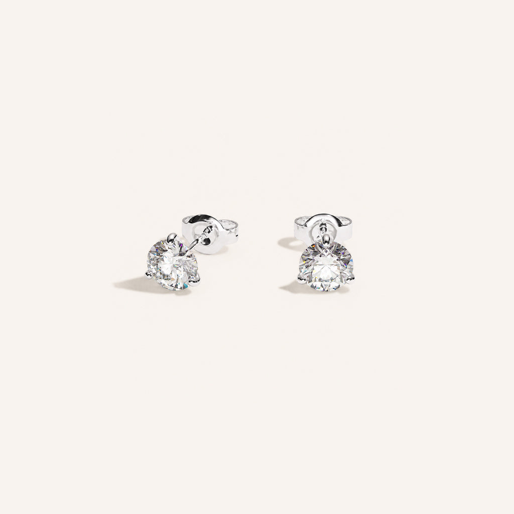 Truine diamond studs, White Gold, 0.40 ct per pair (0.20 ct per diamond), approx. 3.8 mm diameter. Proportional size illustration.